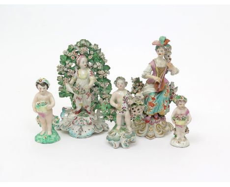 Five Derby porcelain figures  c.1770-80, one of a lady seated and playing the mandolin, another of a girl with an apron of fl