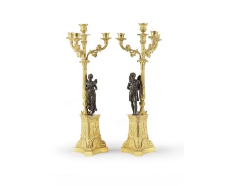 PAIRE DE CANDELABRES LOUIS-PHILIPPE EN BRONZE DORE ET BRONZE PATINE A TROIS BRAS DE LUMIERES  DEUXIEME QUART XIXe SIECLEPAIR 
