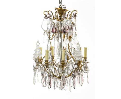 PAIRE DE LUSTRES EN BRONZE DORE ET CRISTAL TAILLE A SIX BRAS DE LUMIERE DANS LE GOUT DU MILIEU DU XVIIIe SIECLEA PAIR OF ORMO