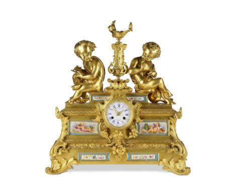 PENDULE D'EPOQUE NAPOLEON III EN BRONZE DORE ET PORCELAINE DE STYLE SEVRES, RAINGO FRERES TROISIEME QUART XIXe SIECLEA NAPOLE