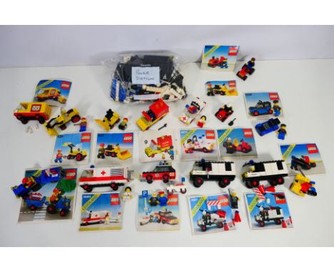 Lego - A group of unboxed vintage Lego kits including Police Van # 6681, Police Station, Service Truck # 6607, Tractor # 6608