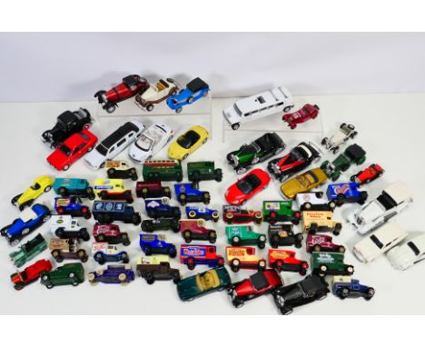 Diecast - A collection of loose diecast vehicles to include: Saico (Ford Anglia, Ford Escort), Signature (Cadillac), Welly (P