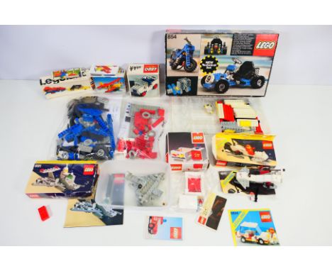 Lego - A collection of mostly boxed vintage Lego sets including Space Scooter # 891, Go-Kart # 854, Baby Cot # 271, Space Cra