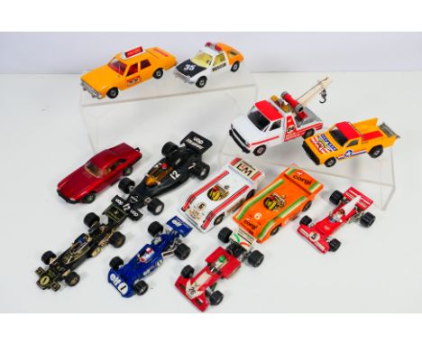 Corgi - Lucky Toys - A group of unboxed models including Chevrolet Caprice Classic Taxi, AMC Pacer, Fort Transit Tow Truck an