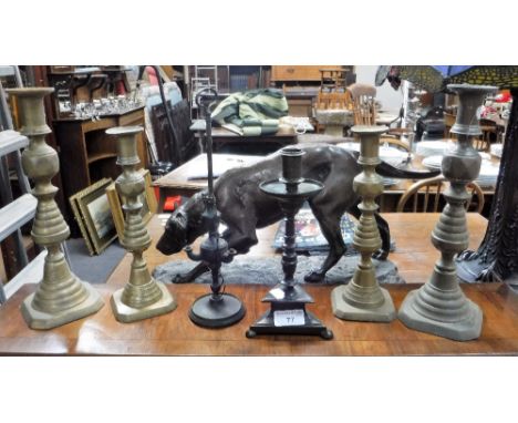 A 17TH CENTURY STYLE PATINATED BRASS CANDLESTICK 9.25" high and others similar
