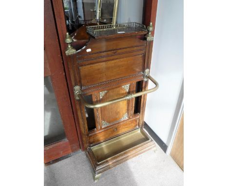 A VICTORIAN AESTHETIC WALNUT STICK-STAND with brass fittings, 40" high x 22" wide 
