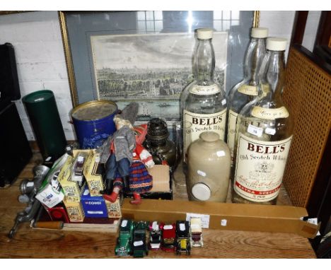 THREE LARGE 'BELL'S OLD SCOTCH WHISKY' EMPTY BOTTLES and a Bell's Old Scotch Whisky Commemorative Royal Decanter with content
