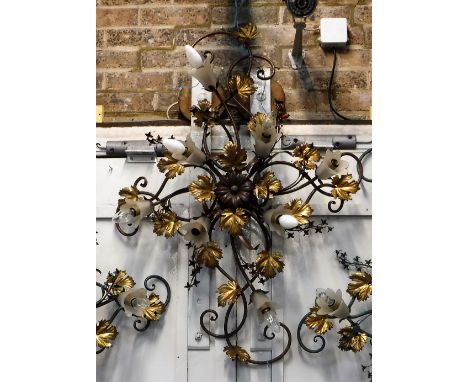 A FLORENTINE STYLE  GILT PAINTED METAL CEILING LIGHT with multiple branch fittings of scrolling foliate design with glass flo