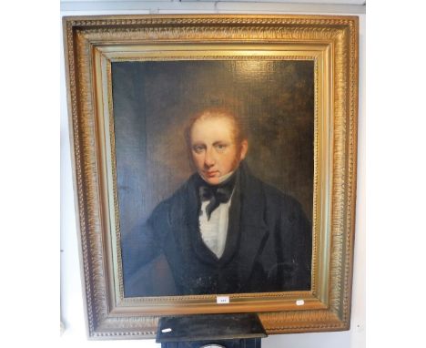 ENGLISH SCHOOL 19th century: A half-length portrait of a gentleman, wearing a black bow-tie, oil on board 