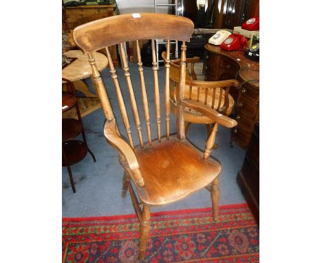 A 19TH CENTURY STICK-BACK ARMCHAIR with elm seat