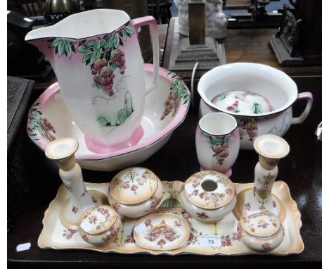 AN EDWARDIAN BLUSH IVORY CERAMIC DRESSING TABLE SET, and a 1920s jug and bowl set