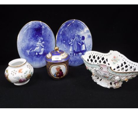 A SEVRES STYLE LIDDED VASE decorated with a portrait and flowers against a blue and gilt ground and other ceramics