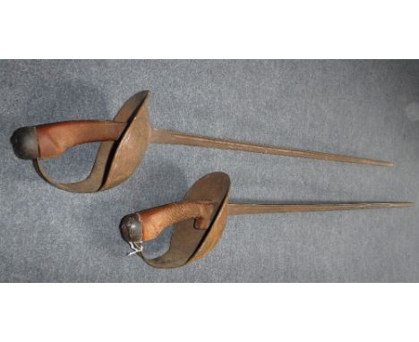 TWO 1908 PATTERN CAVALRY TROOPER'S SWORDS,the slender blades marked 'Wilkinson', both 108 cm long