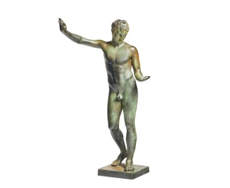 AFTER THE ANTIQUE- A BRONZE FIGURE OF THE 'YOUNG MAN OF MARATHON'  20TH CENTURY  With antiqued verdigris patination  63cm hig
