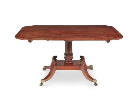 Y&nbspA REGENCY MAHOGANY AND ROSEWOOD CROSSBANDED BREAKFAST TABLE  EARLY 19TH CENTURY The shaped rectangular top above a base