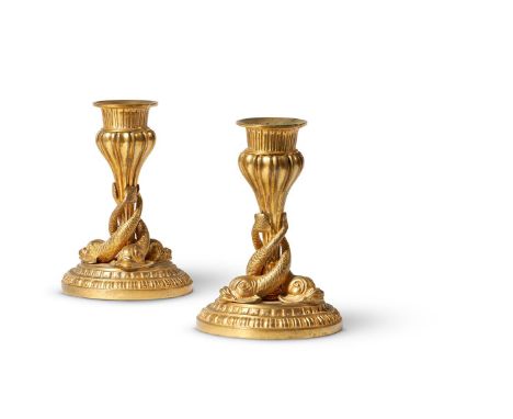 A PAIR OF FRENCH EMPIRE REVIVAL GILT BRONZE CANDLESTICKS  LATE 19TH CENTURY  Entwined dolphin supports, numbered 304 to under