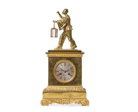 A FRENCH GILT METAL AND BRONZE CLOCK  19TH CENTURY   Surmount of figure carrying a lantern, movement stamped for Linet Freres