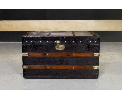 A Victorian painted wood and canvas trunk, late 19th century, with brass mounts, 75cm wide45cm deep45cm highCondition ReportT
