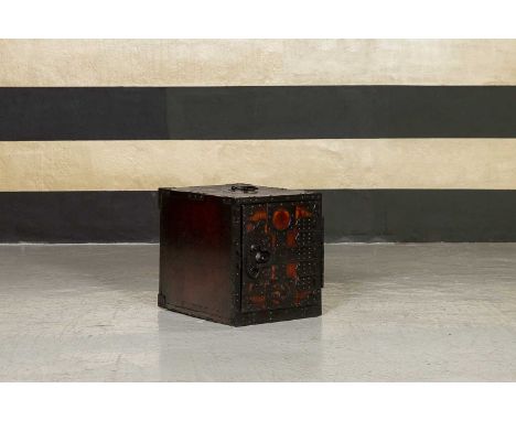 A wooden captain's sea safe, 20th century, Japanese, with iron mounts, enclosing fitted drawers and cupboard doors, 46cm wide