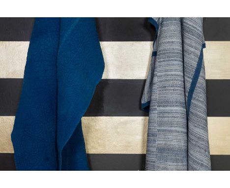Two indigo-dyed textiles, comprising:a 19th-century French hemp,274 x 204cm, anda cotton quilted length,127 x 176cm (2)