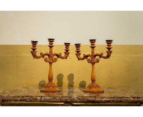 A pair of Louis XV-style carved fruitwood candelabra, c.1900, Continental, each with two scrolling branches, 31cm wide14cm de