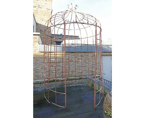 An iron-framed pergola,  20th century, of domed form with a scrolling crown top, 195cm diameter 310cm high  Condition ReportL