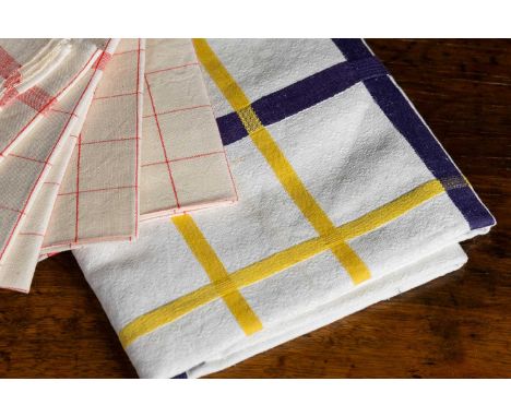 A group of linens, 19th century, French, including a set of six red checked tea towels and a blue and yellow checked tableclo