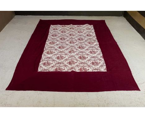 A printed cotton quilt, 19th century and later, French, with a toile de Jouy panel within a wide border,320 x 206cm