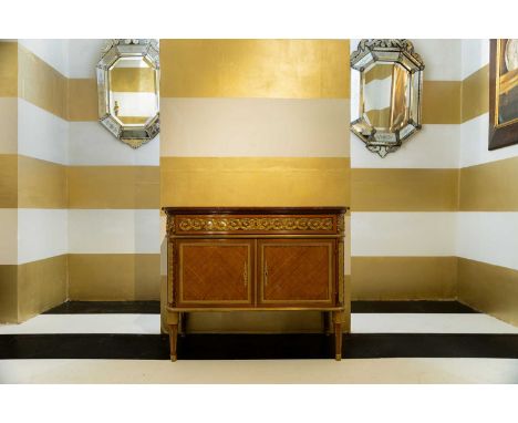 A Napoleon III parquetry commode, c.1870, French, in the manner of François Linke, the rouge griotte marble top above an ormo