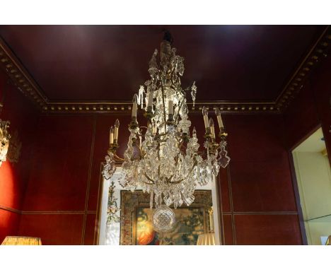 A Louis Philippe cut-glass and gilt-brass chandelier,  c.1850, French, with twelve scrolling branches suspending numerous fol