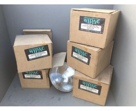 Five boxed Wipac new old stock headlamp units. 
