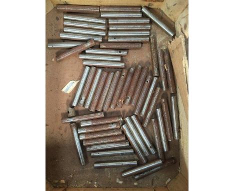 A box of Austin 7 king pins, new old stock but with light rust.