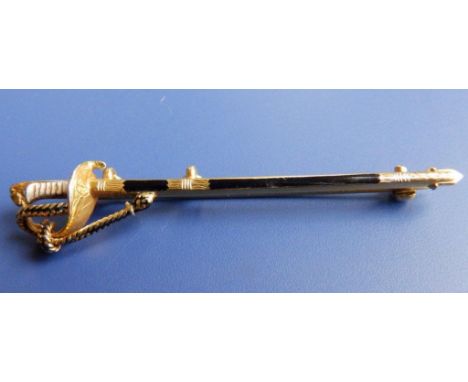 A 9ct gold enamelled naval sword tie pin