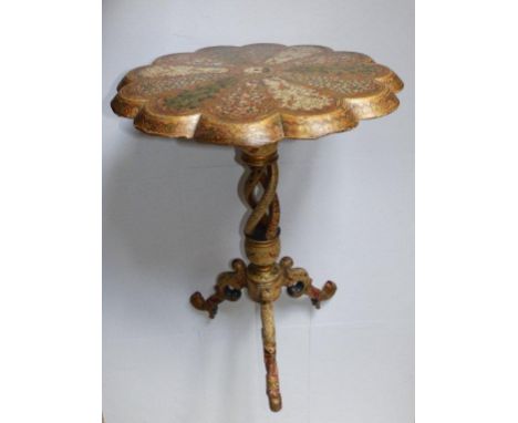 A 19thC Anglo Indian polychrome painted tripod table, decorated overall in leaves, flowers and birds, the scalloped top above