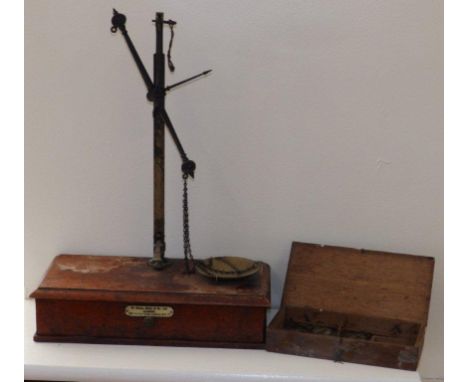 A set of balance scales – incomplete and one other