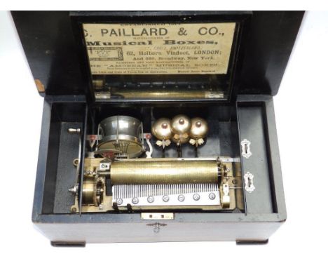 A late 19thC drum and bells-in-sight musical box, playing 10 airs on a  9” cylinder, Paillard advert pasted to interior of li