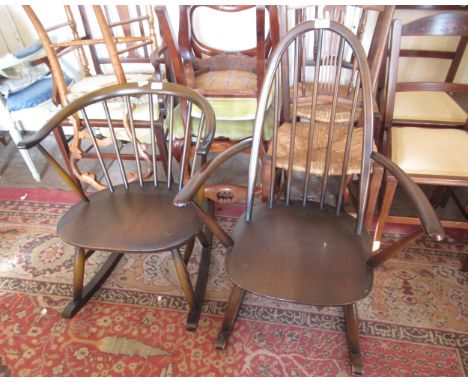 Two Ercol dark elm rocking chairs