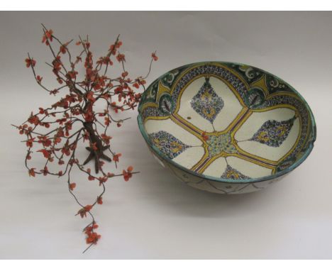 Large North African pottery bowl, pair of 19th Century copper lustre jugs and a Chinese miniature ornamental tree with glass 