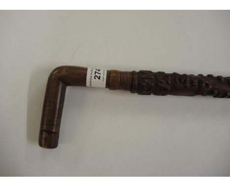 Carved hardwood walking stick marked T G May, 1872