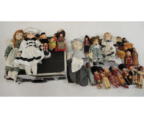 Wicker picnic hamper, another similar and a quantity of various modern dolls