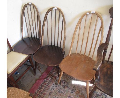 Three mid 20th Century Ercol stickback chairs (one light, two dark wood)