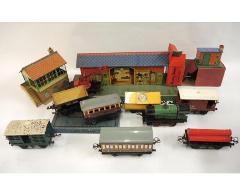 Quantity of various items of Hornby 'O' gauge tin plate model railway including engine, rolling stock , station etc
