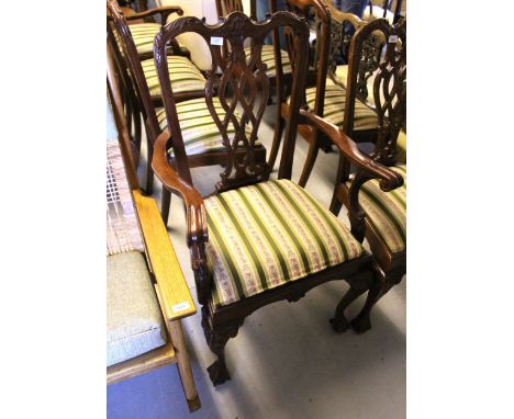 Reproduction mahogany dining room suite, comprising of a set of nine (seven plus two) Chippendale style chairs, together with