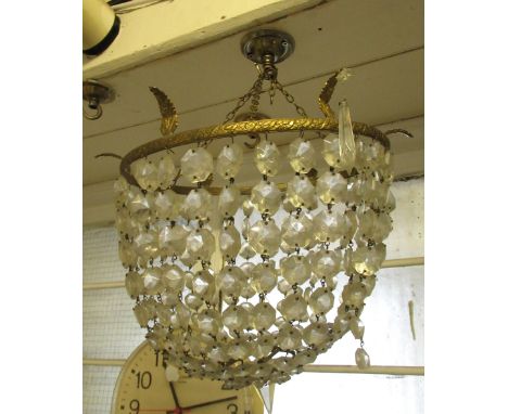 Two 20th Century brass and glass bag form light fittings