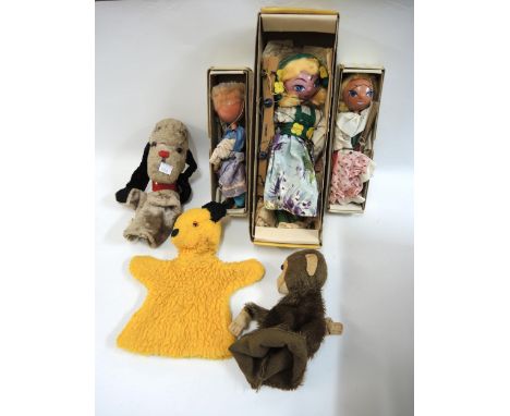 Three glove puppets, Chad Valley figure of Sweep, another of Sooty and another of a monkey, together with three boxed Pelham 