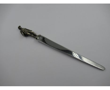 Tiffany and Company sterling sliver and steel paper knife, the finial in the form of a jockey