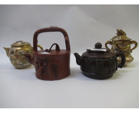Two Chinese terracotta teapots, together with two items of Japanese Satsuma pottery (at fault)