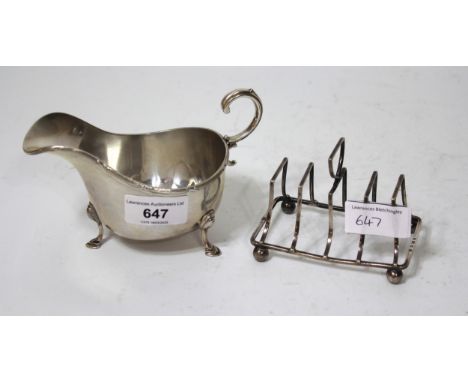 Silver four division toast rack, dated 1900, and a silver helmet shaped gravy boat, dated 1913, 7oz t