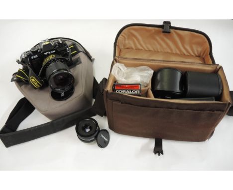 Nikon F301 film camera with lens, together with another lens and various accessories