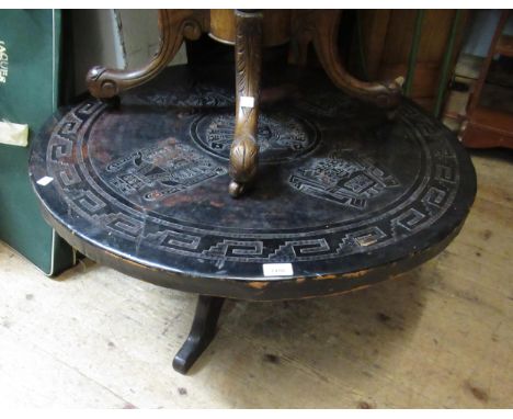 Mid 20th Century circular coffee table with an embossed leather covered top on a tripod base, 86cm diameter